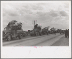 State highway officials moving evicted sharecroppers away from roadside to area between the levee and the Mississippi River, New Madrid County, Missouri