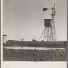 Windmill and water storage tank