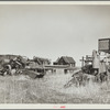 Home of wheat farmer-speculator. Cheap house and heavy investment in machinery. Box Butte County, Nebraska