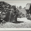 Sharpening a saw. Pine Ridge land use project. Dawes County, Nebraska