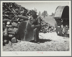 Sharpening a saw. Pine Ridge land use project. Dawes County, Nebraska