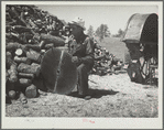 Sharpening a saw. Pine Ridge land use project. Dawes County, Nebraska