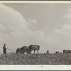 At work on a stock water dam. Pine Ridge land use project. Sioux County, Nebraska