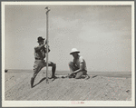 Surveyors on a stock water dam. Dawes County, Nebraska