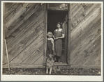 Farm wife and child who are to be removed to better farmland while present will revert to grazing land. Oneida County, Idaho