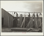 Carpenters at work on barracks for Resettlement Administration construction camp. Oneida County, Idaho