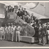 Aline MacMahon, Walter Abel, cast and the crew of the touring company of the stage production Hamlet, posing with military officers in front of Air Force plane at Westover Air Force Base