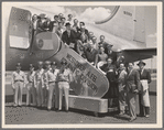 Aline MacMahon, Walter Abel, cast and the crew of the touring company of the stage production Hamlet, posing with military officers in front of Air Force plane at Westover Air Force Base