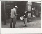 Newsboy on main street, Montrose, Colorado