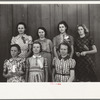 Daughters of resettlement clients who have formed 4-H Club and won fair prizes posed with their leader, Mrs. Lucky (second from left), Western Slope Farms, Colorado