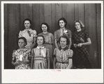 Daughters of resettlement clients who have formed 4-H Club and won fair prizes posed with their leader, Mrs. Lucky (second from left), Western Slope Farms, Colorado