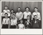 4-H Club boys, all sons of resettlement families on Western Slope Farms, Colorado, pose with their leader (top row, third from left)