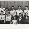 4-H Club boys, all sons of resettlement families on Western Slope Farms, Colorado, pose with their leader (top row, third from left)