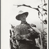 Thomas W. Beede exhibits some of the corn grown on his farm, Western Slope Farms, Colorado