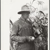 Thomas W. Beede exhibits some of the corn grown on his farm, Western Slope Farms, Colorado