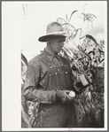 Thomas W. Beede exhibits some of the corn grown on his farm, Western Slope Farms, Colorado
