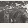 Farmers at cornhusking contest, Marshall County, Iowa