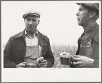 Farmers at cornhusking contest, Marshall County, Iowa