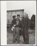 Spectators at cornhusking contest, Marshall County, Iowa