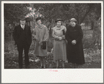 Spectators at cornhusking contest, Marshall County, Iowa