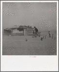 Farmer and sons walking in the face of a dust storm. Cimarron County, Oklahoma