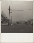 Autos have to turn on lights to penetrate gloom of dust storm. Amarillo, Texas