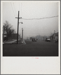 Autos have to turn on lights to penetrate gloom of dust storm. Amarillo, Texas