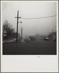 Autos have to turn on lights to penetrate gloom of dust storm. Amarillo, Texas