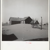 Dust piled up around farmhouse. [Cimarron County?,] Oklahoma