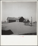 Dust piled up around farmhouse. [Cimarron County?,] Oklahoma