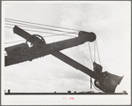 Steam shovels ruin good farmland in strip mining operations. Cherokee County, Kansas