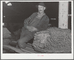 Rehabilitation client with his tobacco crop. Oxford, North Carolina