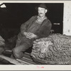 Rehabilitation client with his tobacco crop. Oxford, North Carolina