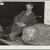 Rehabilitation client with his tobacco crop. Oxford, North Carolina