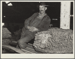 Rehabilitation client with his tobacco crop. Oxford, North Carolina