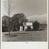 Visitors inspect a completed home. Greenbelt, Maryland