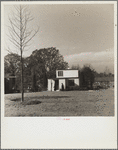 Visitors inspect a completed home. Greenbelt, Maryland