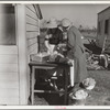 Mrs. C.D. Grant and neighbor making pork sausage. Penderlea Farms, North Carolina