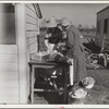 Mrs. C.D. Grant and neighbor making pork sausage. Penderlea Farms, North Carolina