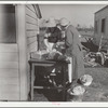 Mrs. C.D. Grant and neighbor making pork sausage. Penderlea Farms, North Carolina