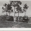 A family of eight from Tennessee camped near citrus packing plant at Winterhaven, Florida