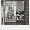 Barber shop window [with circus poster] in Birmingham, Alabama