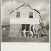 Painting one of the new houses for industrial and white collar workers of Birmingham. Slagheap Village [i.e. Cahaba Village], Alabama
