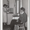 Mr. and Mrs. Andey Smith in the kitchen of their new home. Greenwood, [Jefferson County?,] Alabama