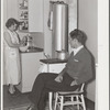 Mr. and Mrs. Andey Smith in the kitchen of their new home. Greenwood, [Jefferson County?,] Alabama