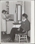 Mr. and Mrs. Andey Smith in the kitchen of their new home. Greenwood, [Jefferson County?,] Alabama