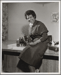 Rose Morgan sitting on a desk with beauty products