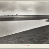 Completed stock water dam which will benefit ranch in background. Pennington County, South Dakota