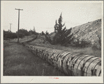 Water is precious in central Oregon and this irrigation flume comes a long way from the Deschutes River to help grow alfalfa. Oregon