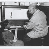 Photographic reproduction of John W. Cooper and his dummy, Sam Jackson